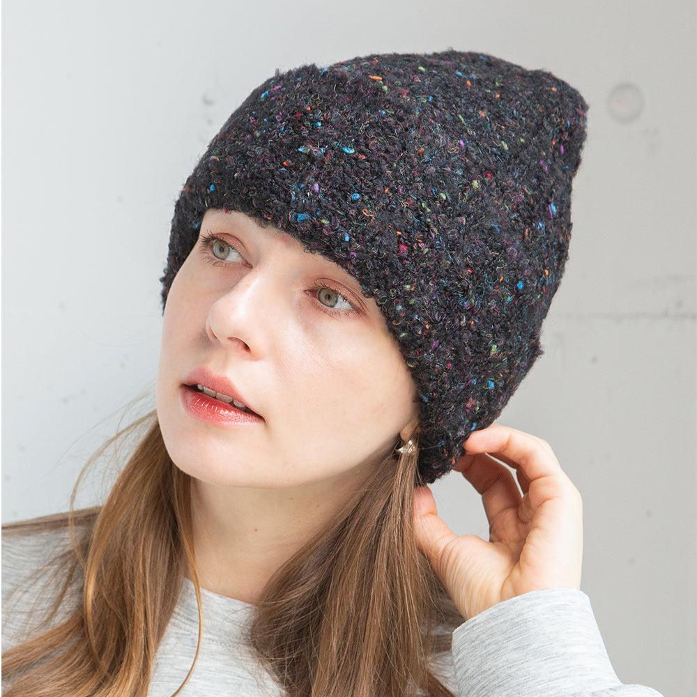 ブークレリブ編みニット