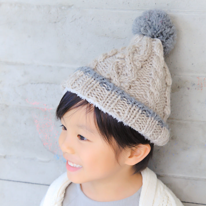 ポンポンケーブル編ツートンニット